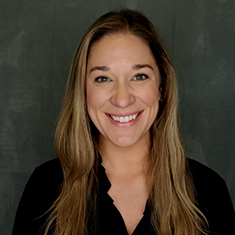 Professional headshot of Erica Quin