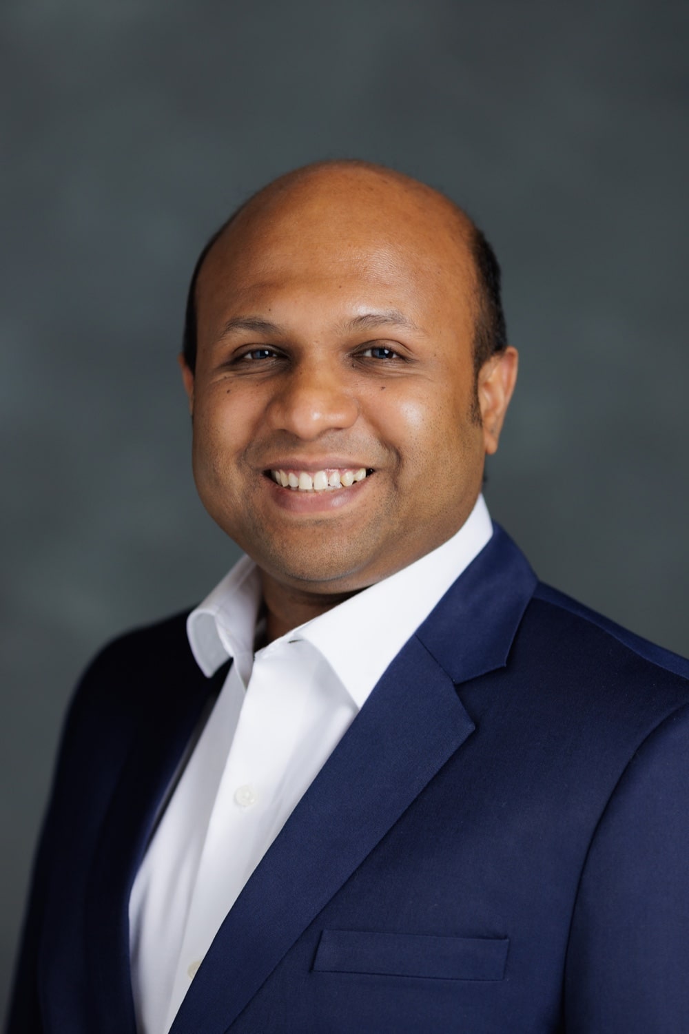 Professional headshot of Ahmedullah Aziz