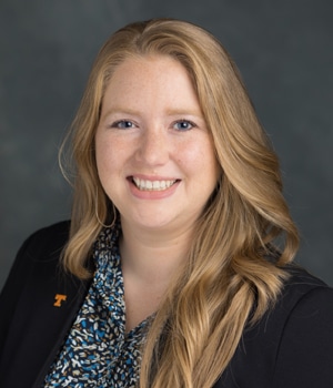 Professional headshot of Ali Smith