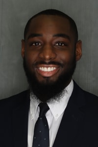 Professional headshot of Caleb Roberson