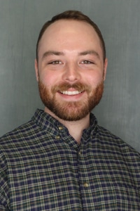 Professional headshot of Evan Oliver