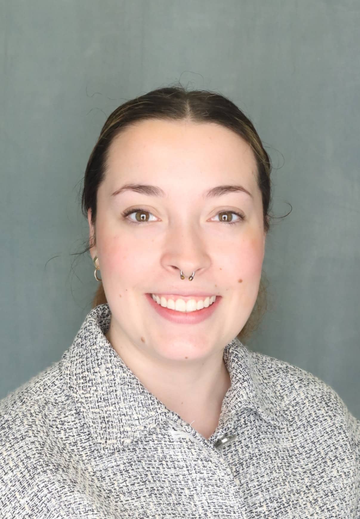 Professional headshot of Kat White