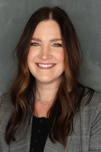 Professional headshot of Leslie Walton