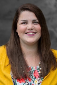 Professional headshot of Miciah Burns