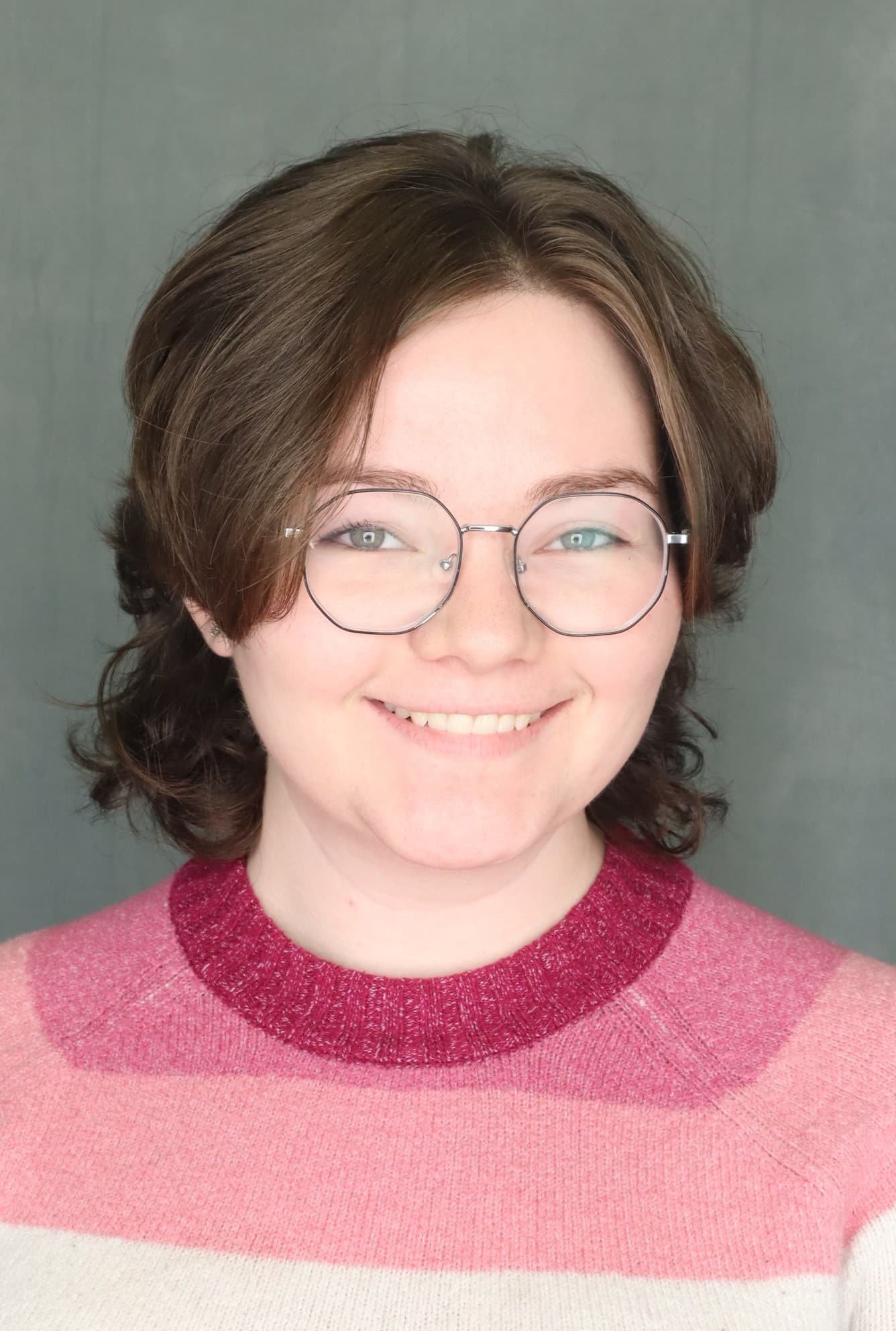 Professional headshot of Riley Sapp