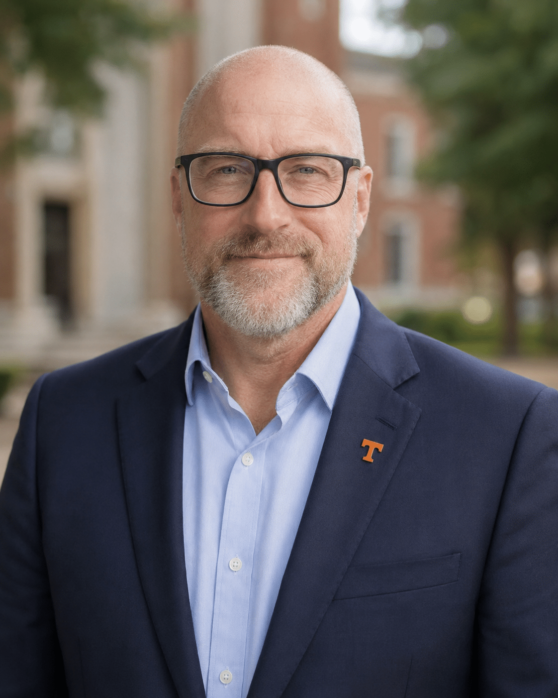 Professional headshot of Dr. Patrick Akos