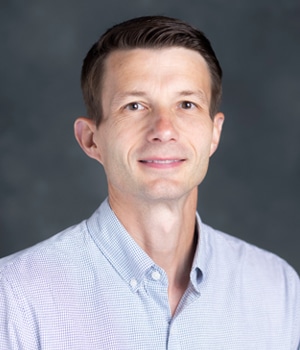 Professional headshot of Patrick Biddix