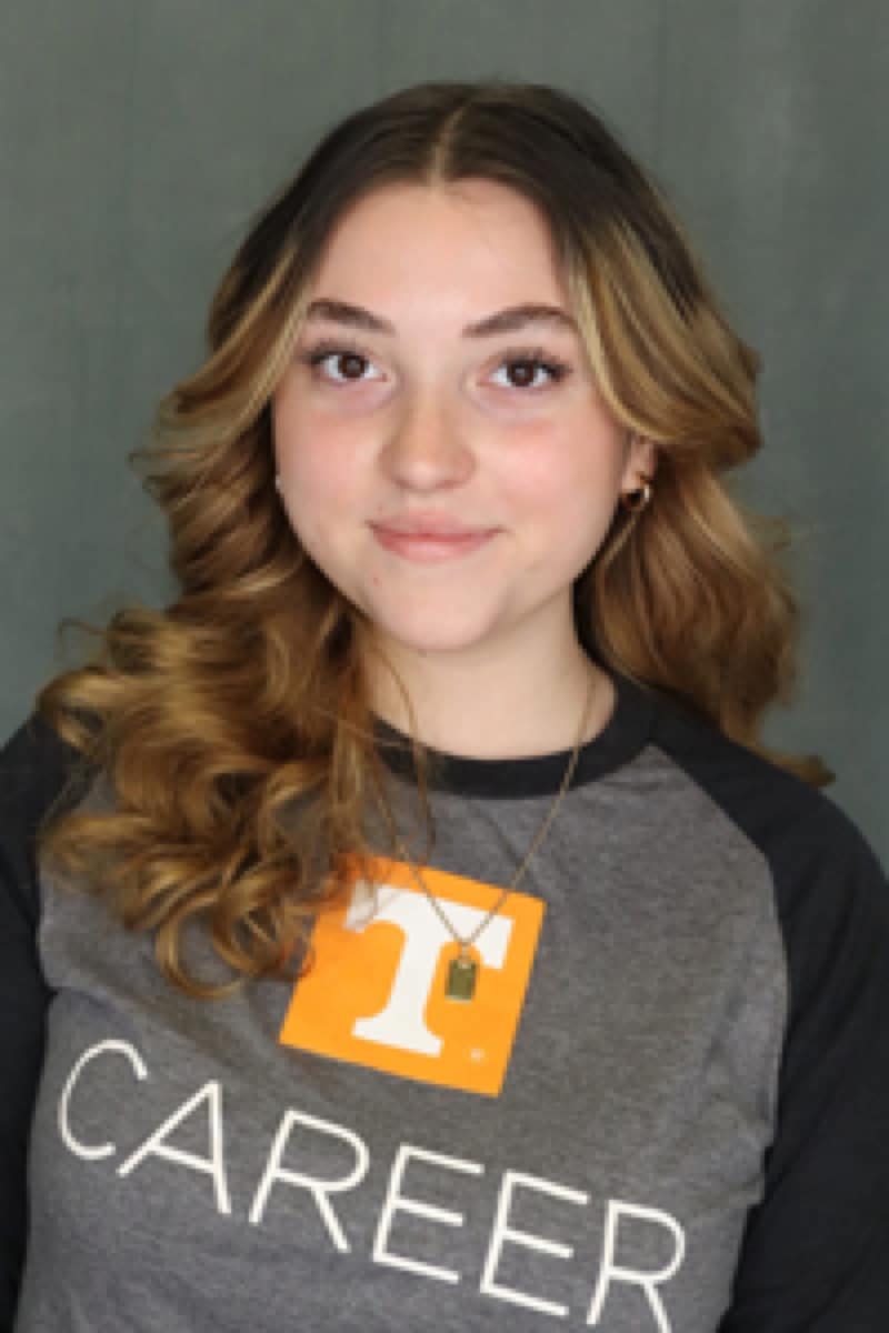 Professional headshot of Alexus Martini