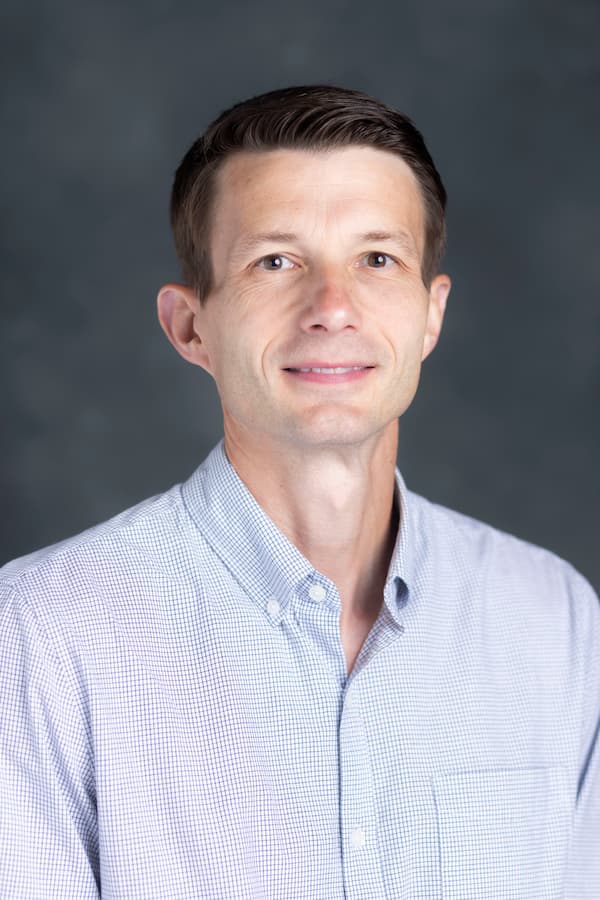Professional headshot of Patrick Biddix