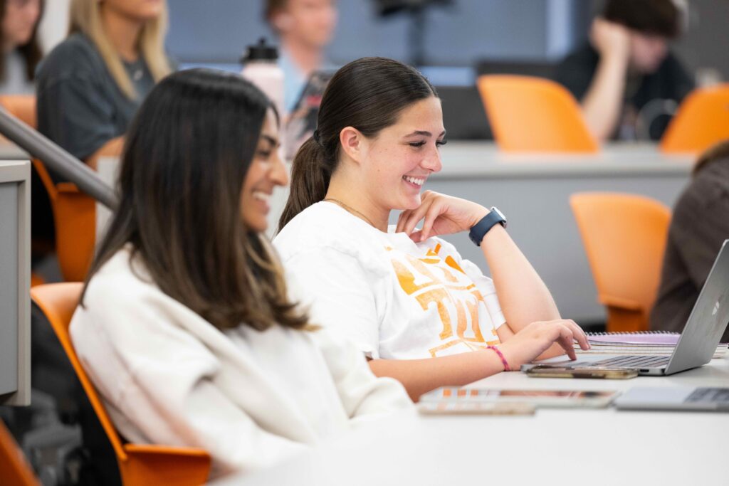 Students participate in a Nurtrion lecture (NUTR 101) inside Ken and Blaire Mossman Building Rm 202