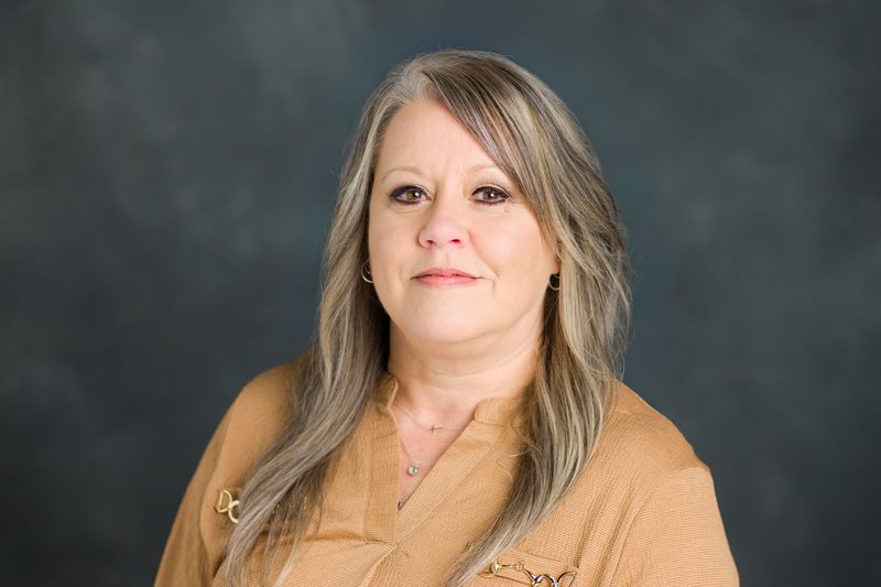 Professional headshot of Aprile Mason